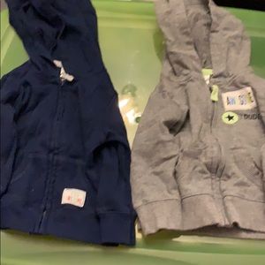 2 carters zip up hoodies size 6 months.